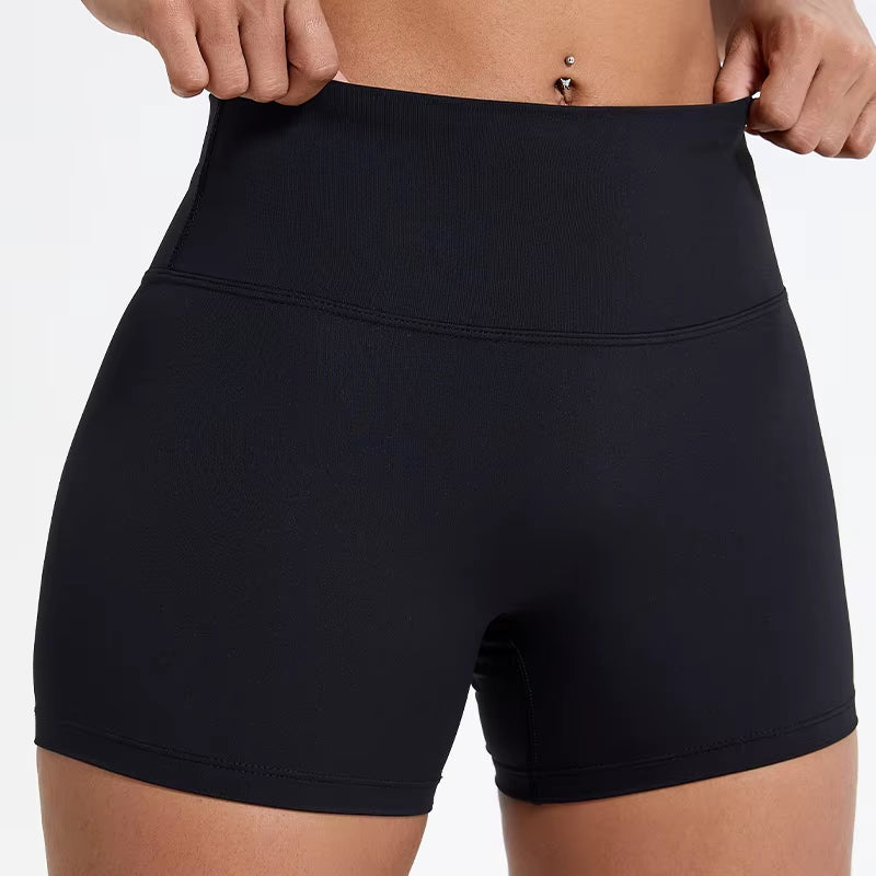 High-waisted sports shorts for women, designed to lift and shape, perfect for gym workouts, running, and fitness training. Made from soft, quick-drying fabric, these yoga shorts are ideal for comfortable and effective exercise.