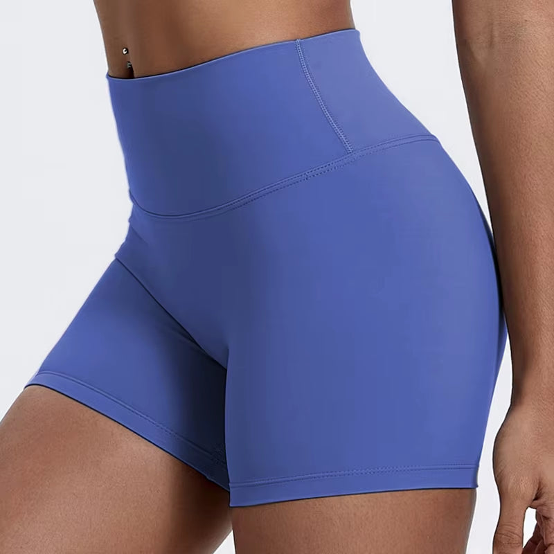 High-waisted sports shorts for women, designed to lift and shape, perfect for gym workouts, running, and fitness training. Made from soft, quick-drying fabric, these yoga shorts are ideal for comfortable and effective exercise.