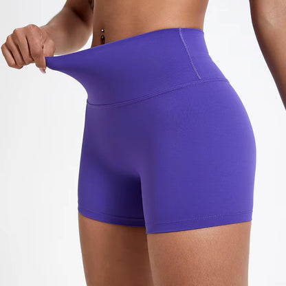 High-waisted sports shorts for women, designed to lift and shape, perfect for gym workouts, running, and fitness training. Made from soft, quick-drying fabric, these yoga shorts are ideal for comfortable and effective exercise.