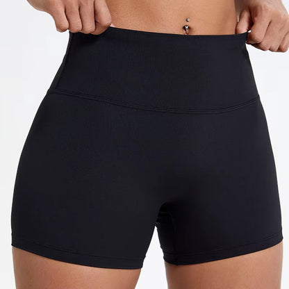 High-waisted sports shorts for women, designed to lift and shape, perfect for gym workouts, running, and fitness training. Made from soft, quick-drying fabric, these yoga shorts are ideal for comfortable and effective exercise.