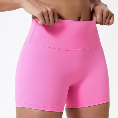 High-waisted sports shorts for women, designed to lift and shape, perfect for gym workouts, running, and fitness training. Made from soft, quick-drying fabric, these yoga shorts are ideal for comfortable and effective exercise.